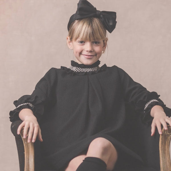 Black dress with beige smock